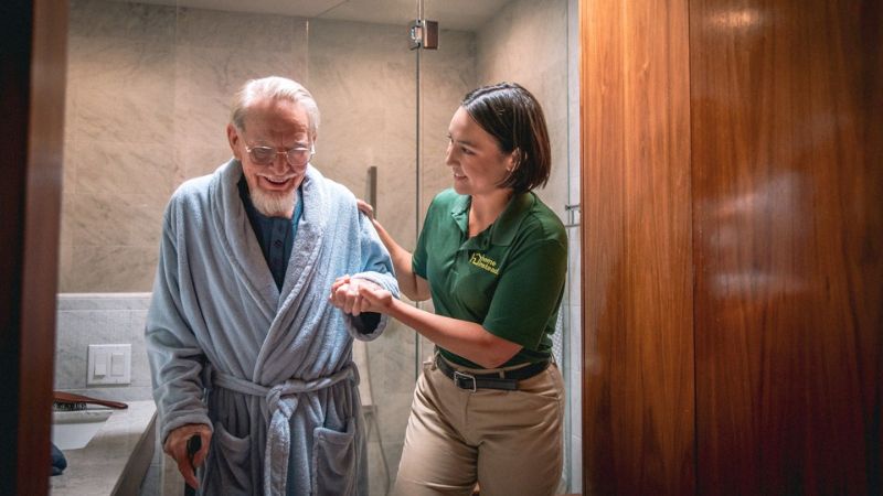 Home Instead caregiver with senior client