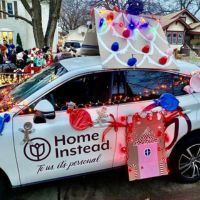 home instead seward, ne gingerbread car at lighted parade