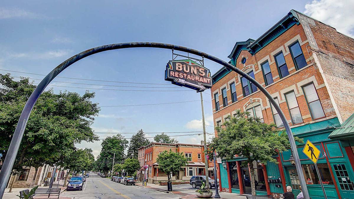 Photo of metal archway over the street with Bun's Restaurant sign a great place for a meal with your senior family member's CAREGiver