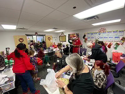 The Home Instead Team Wrapping BASTAS Gifts 3 