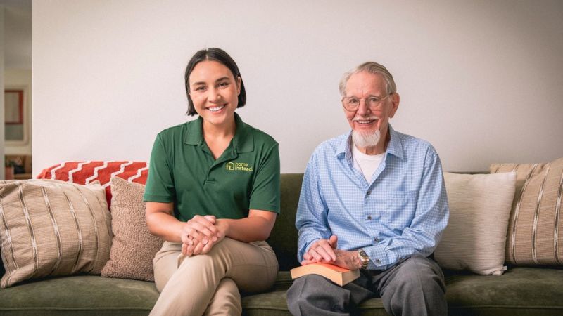 home instead caregiver with senior client