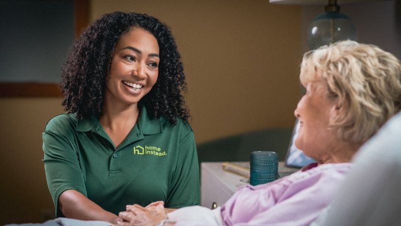Home Instead caregiver with senior client in The Meadows, FL
