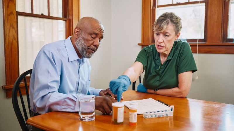 Home Instead caregiver with senior client