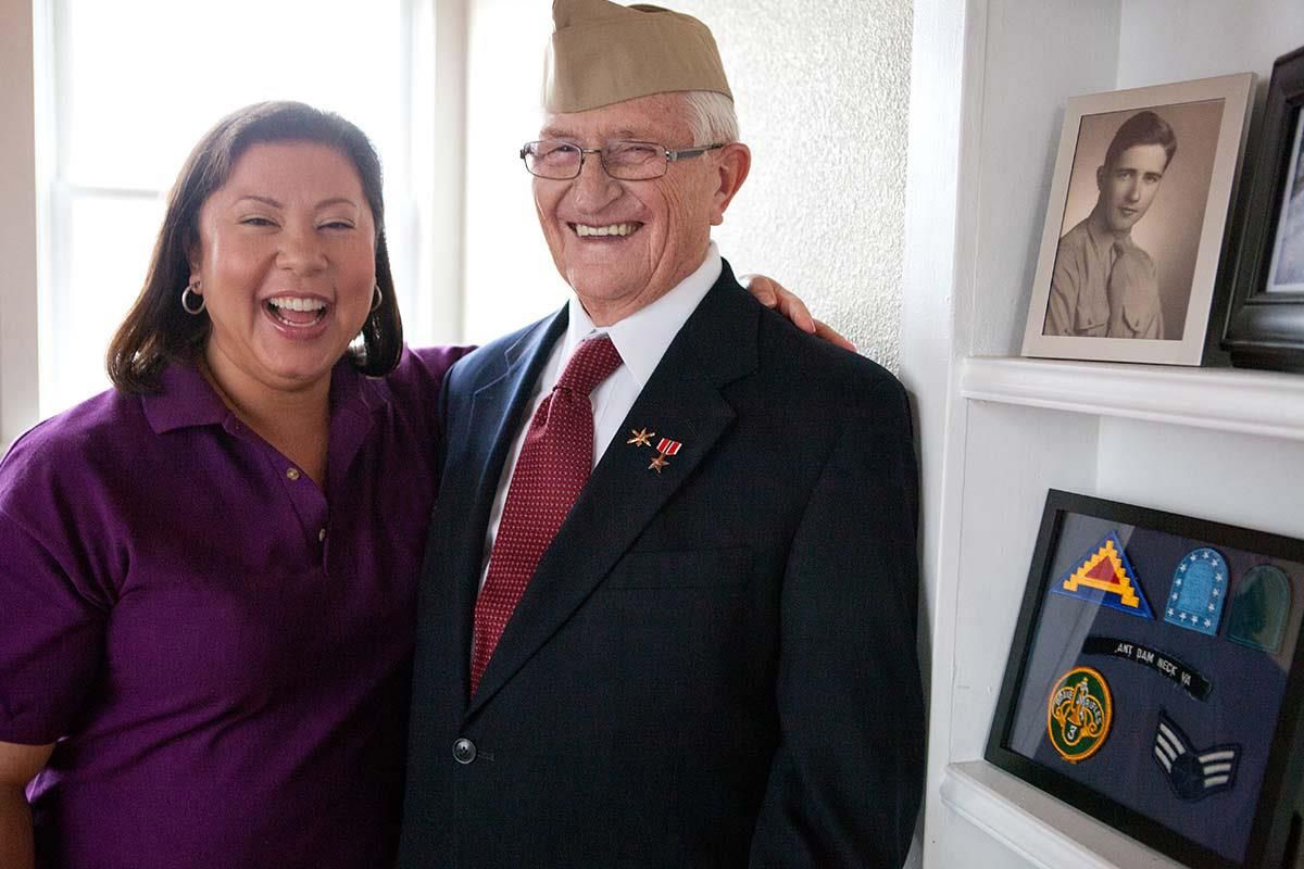 proud veteran and lady smiling