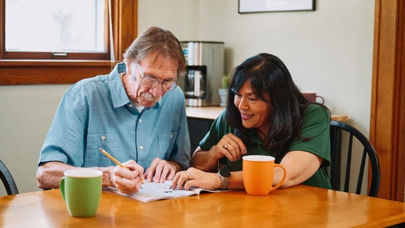 Home Instead caregiver with senior client