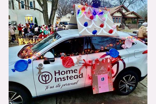 Home Instead's Gingerbread Car Lights the Way at the Seward Lighted Parade
