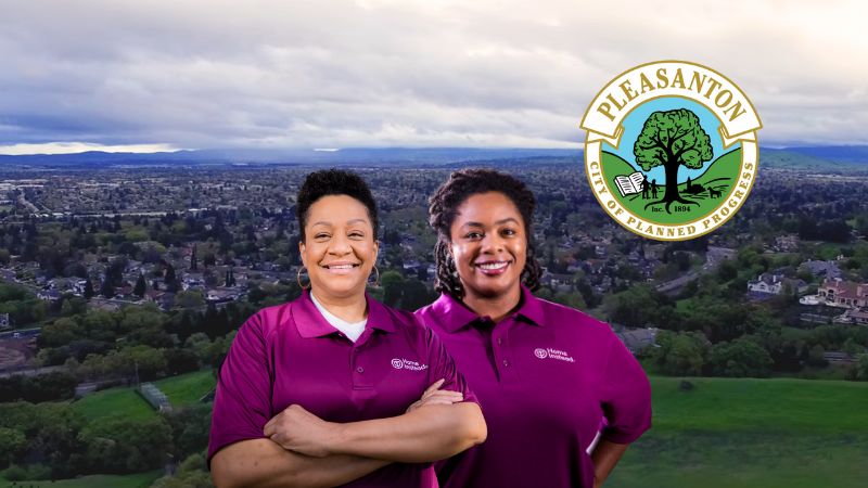 Home Instead caregivers with Pleasanton, California in the background