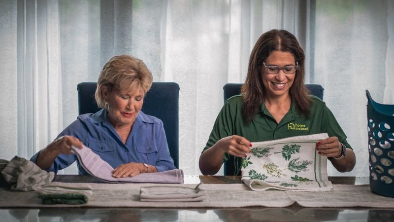 Home Instead caregiver with senior client