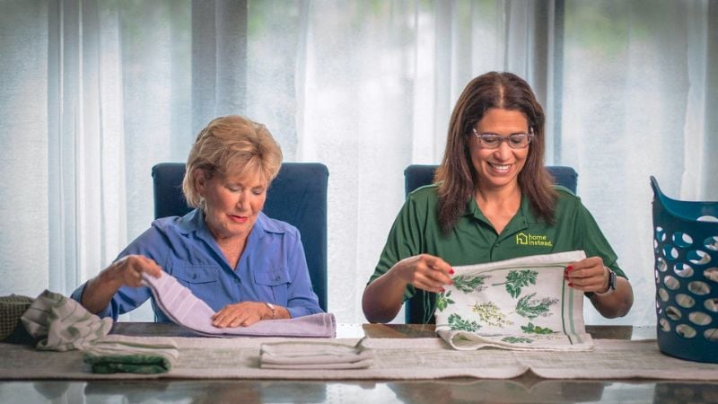home instead caregiver and senior client