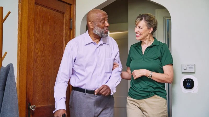 Home Instead caregiver with senior client