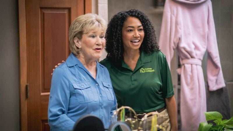Home Instead caregiver with senior client in South Gate Ridge, FL