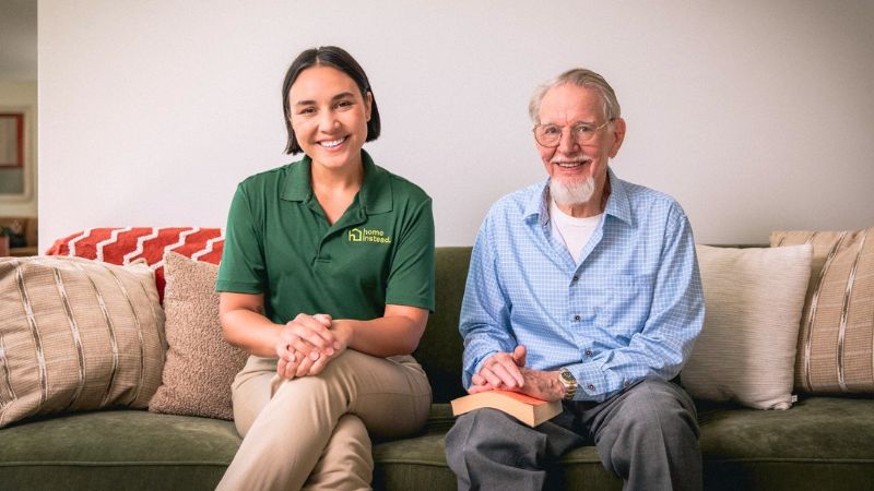Home Instead caregiver with senior client