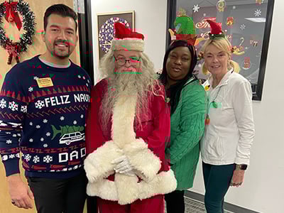 Home Instead Team with Santa at the BASTAS Wrapping Party