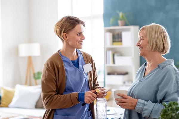 bigstock Senior Woman With Caregiver Or 403890152