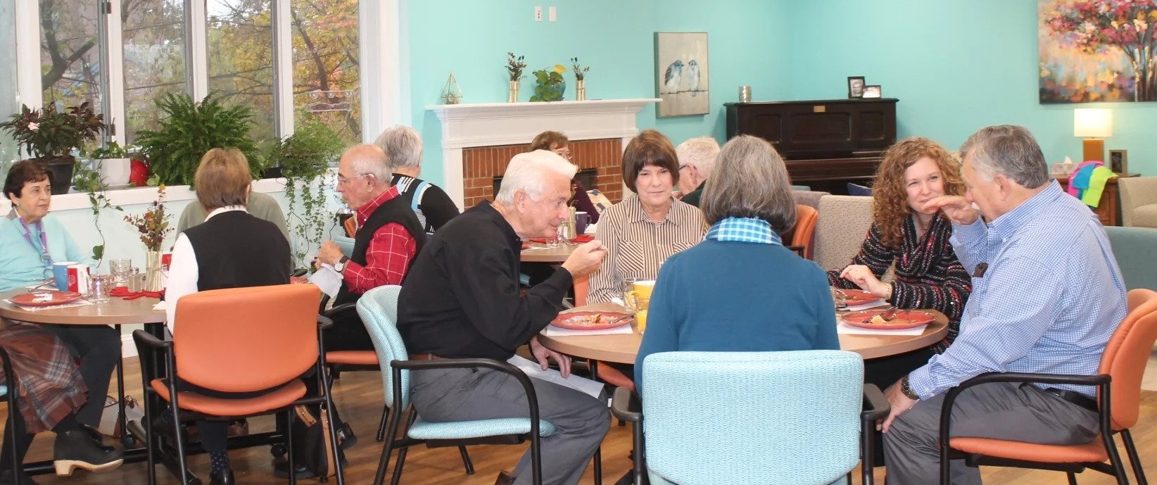 the dementia day program friends club enjoying a community meal