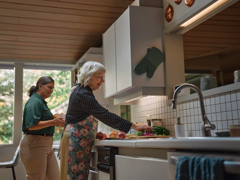 carepro elderly woman kitchen