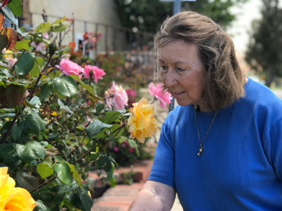 Woman with dementia outside in garden