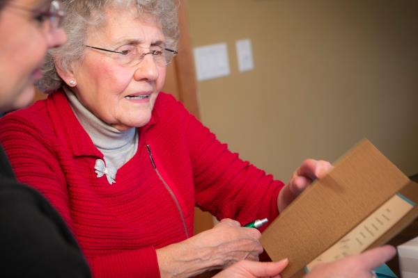Senior looking at letter