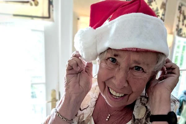 Senior in a santa hat